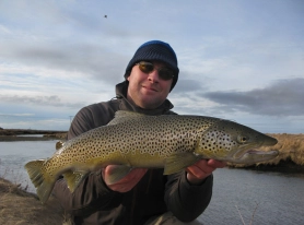 Varmá fishing sea trout in frost. Here the first fish of the trip. Varmá fishing sea trout in frost. Here the first fish of the trip.