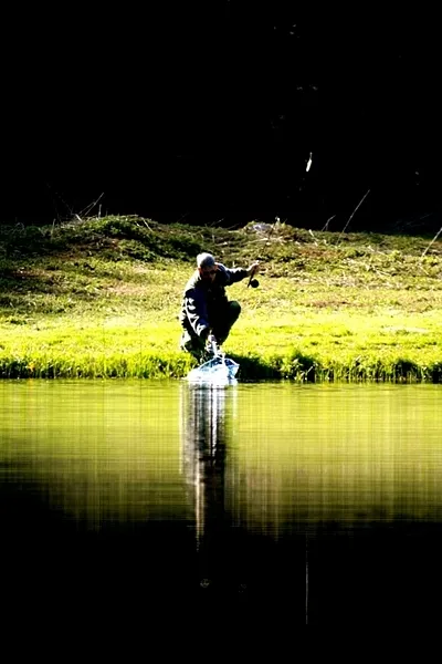 User submitted picture: Landing a rainbow trout a...